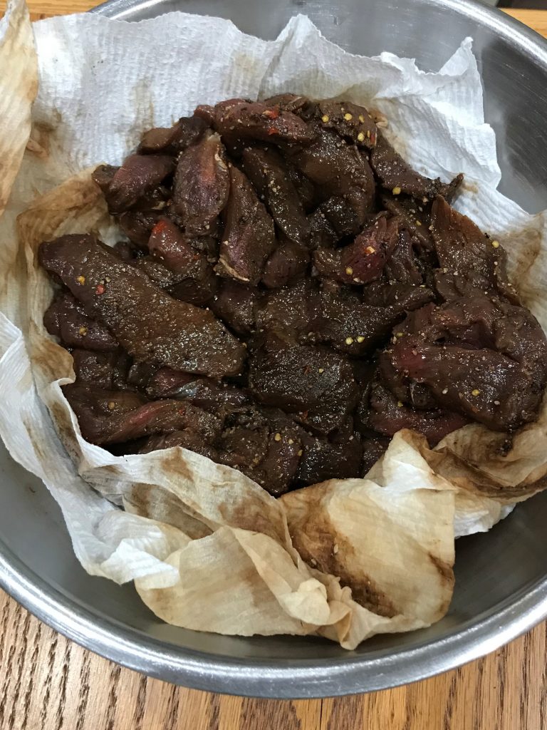 jerky in bowl with paper towels